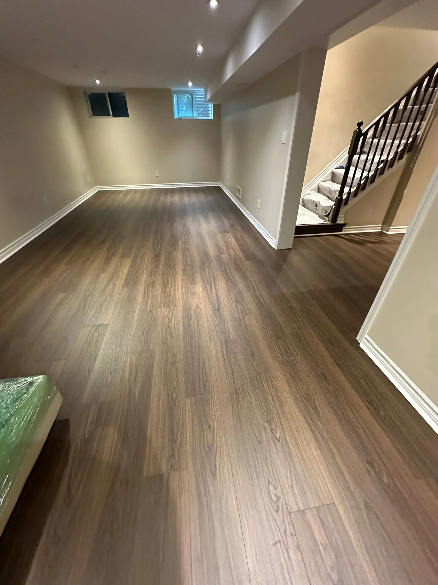 Basement staircase and open floor area
