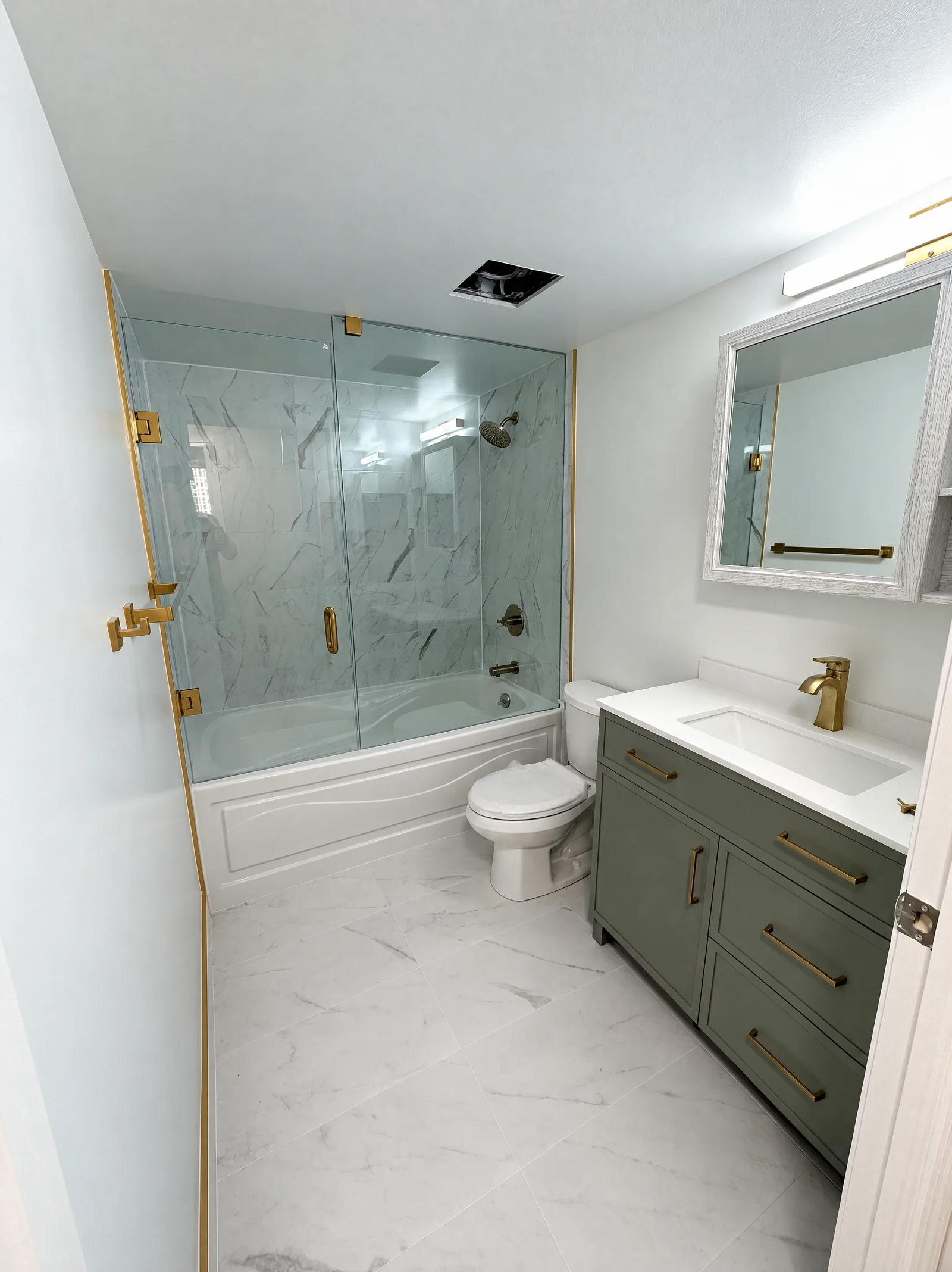 Vanity, tub and glass shower