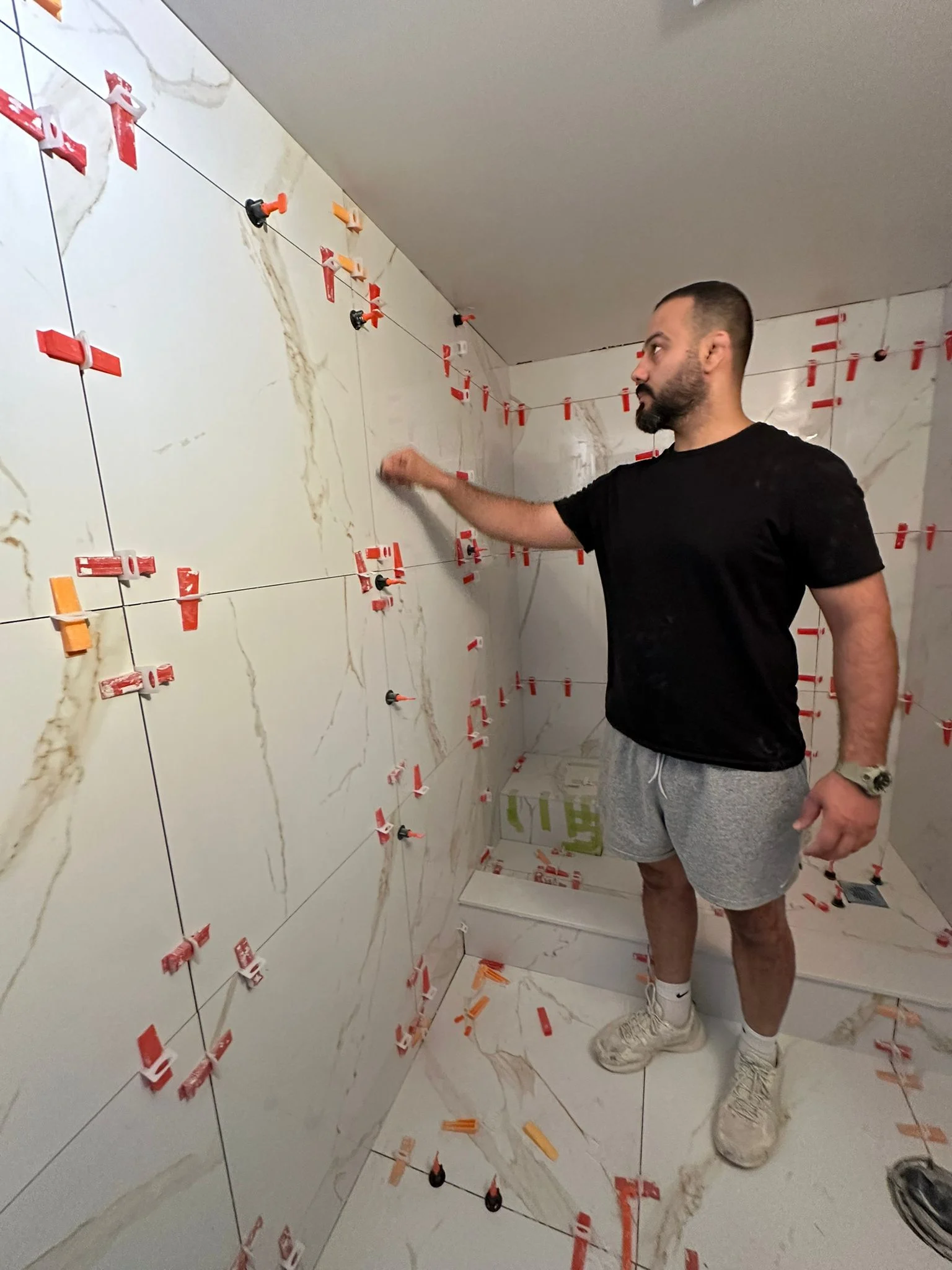 Shower tiling in progress