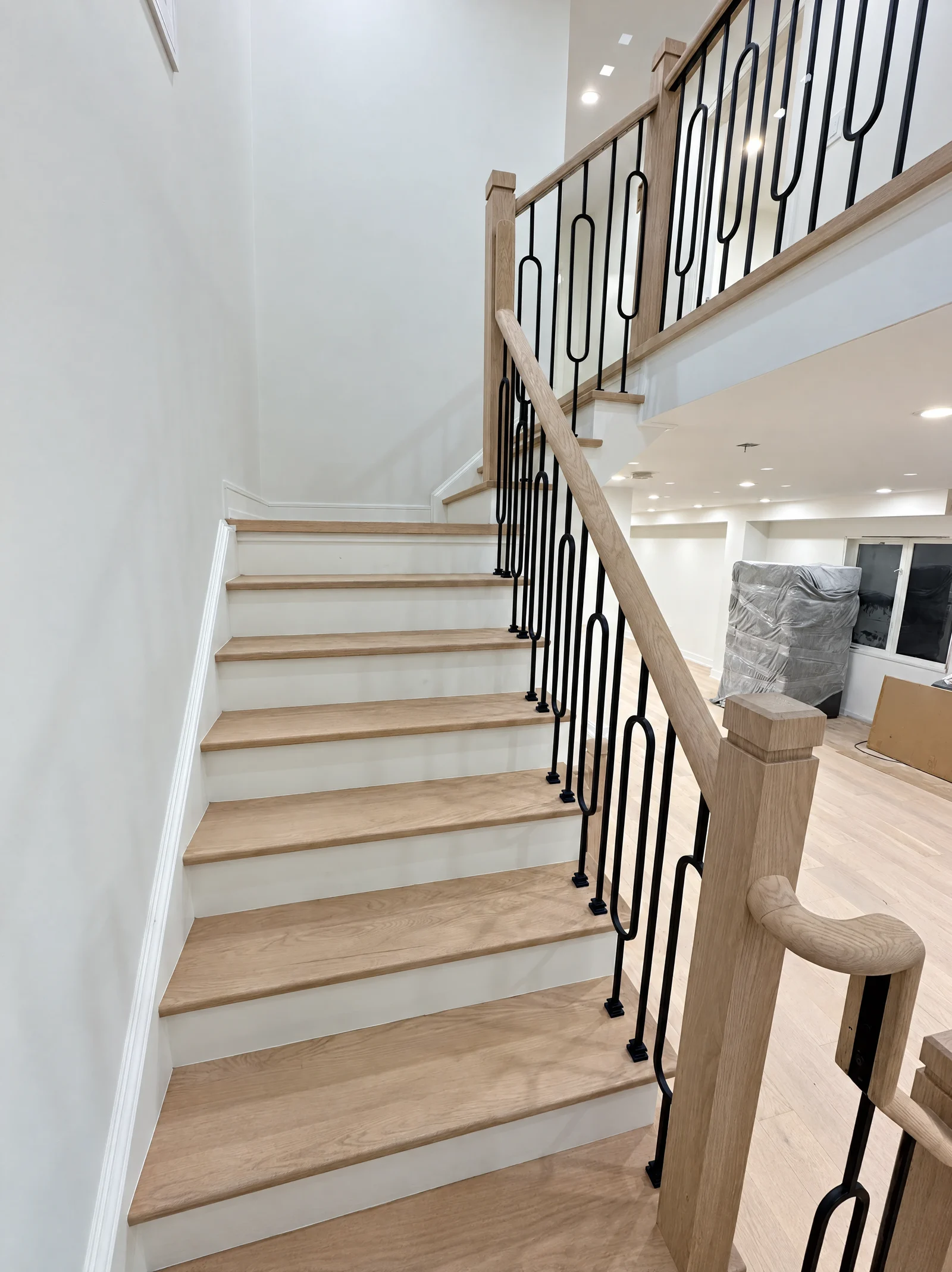 Timber staircase and iron balusters