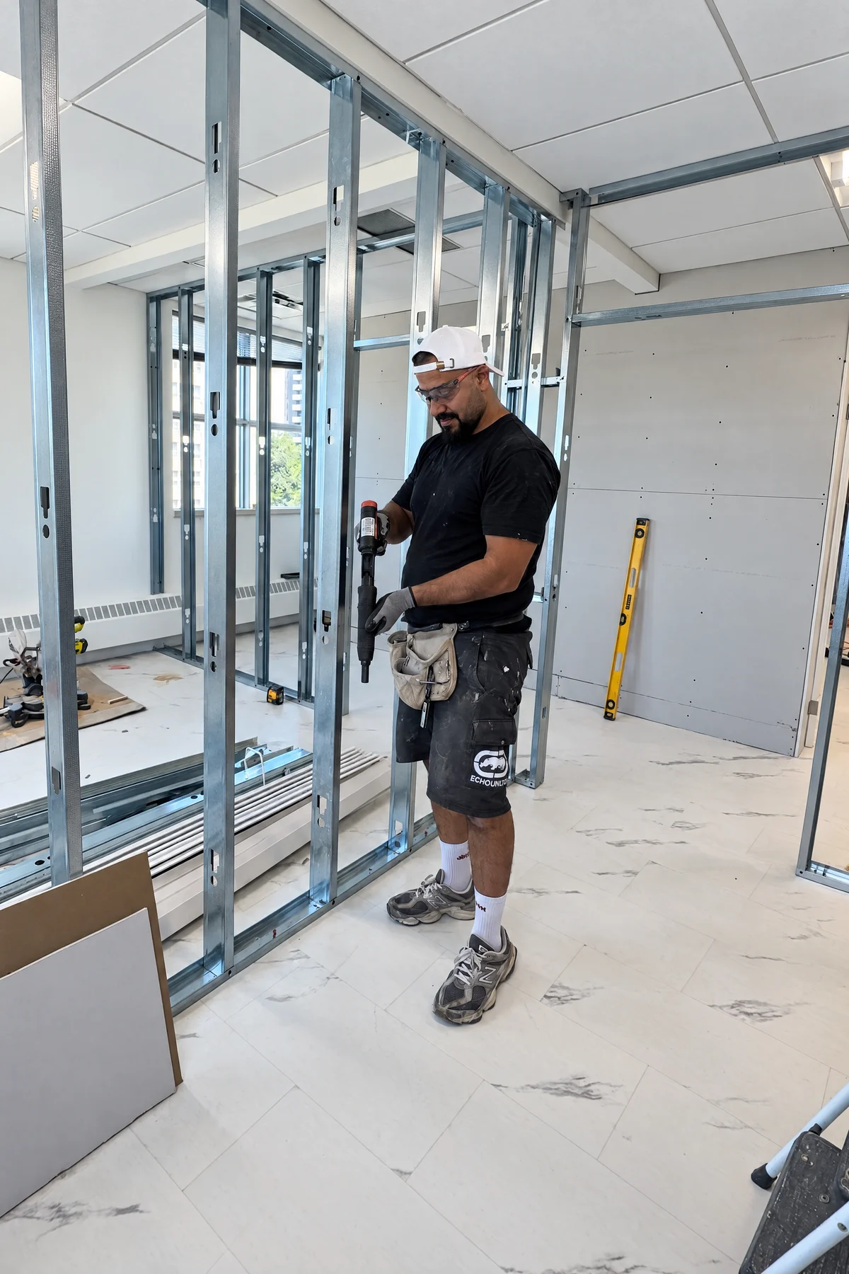 K1 Homes contractor working on steel wall framing